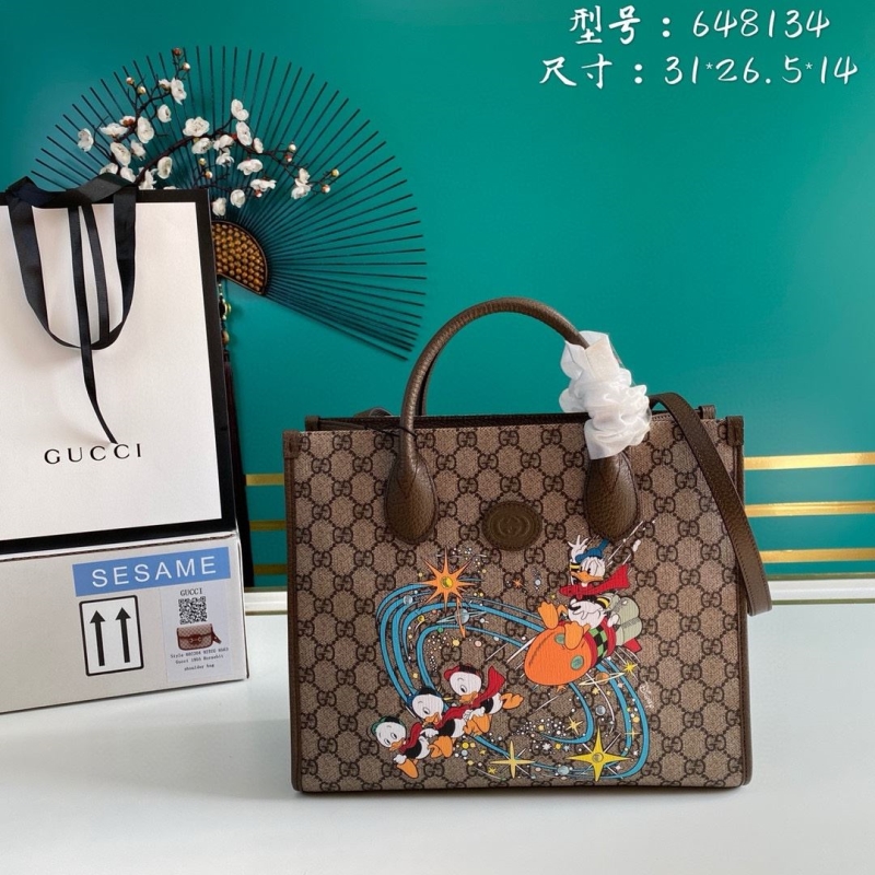 G*u*i shopping bags